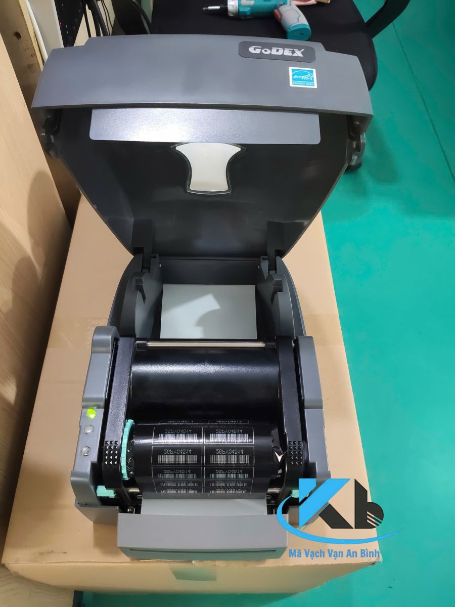 cuon muc wax ben trong may in godex 